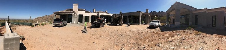 Concrete delivery at a custom home construction site